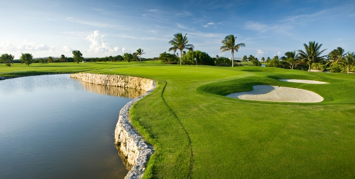 Golf course with water hazard and sand traps
