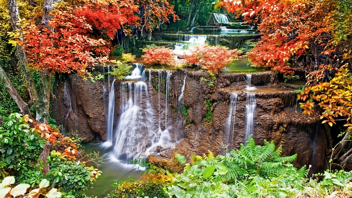 Tiered waterfall with autumn foliage