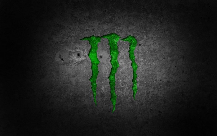 Monster Energy Logo on Textured Surface