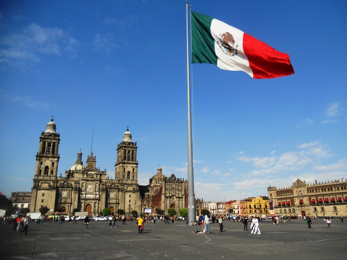 Mexican Flag and Metropolitan Cathedral in Zocalo Square