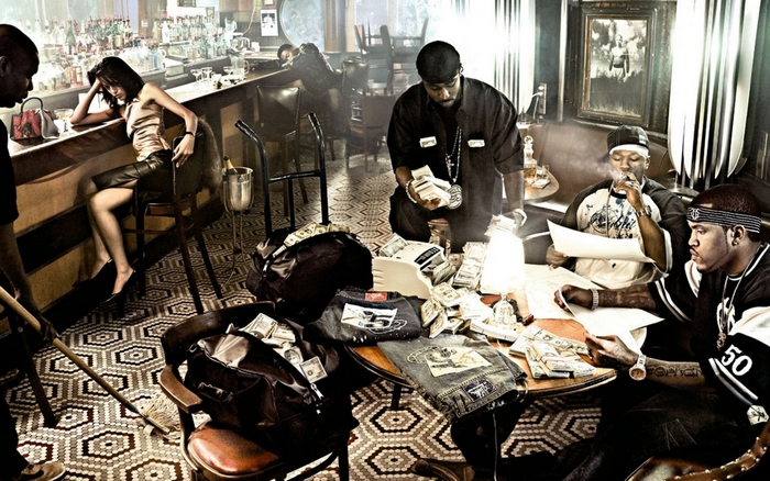 Gangsters with money in a bar