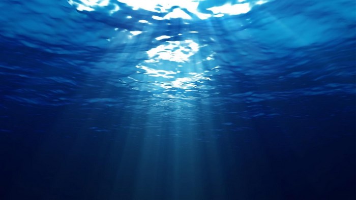 Underwater scene with sun rays