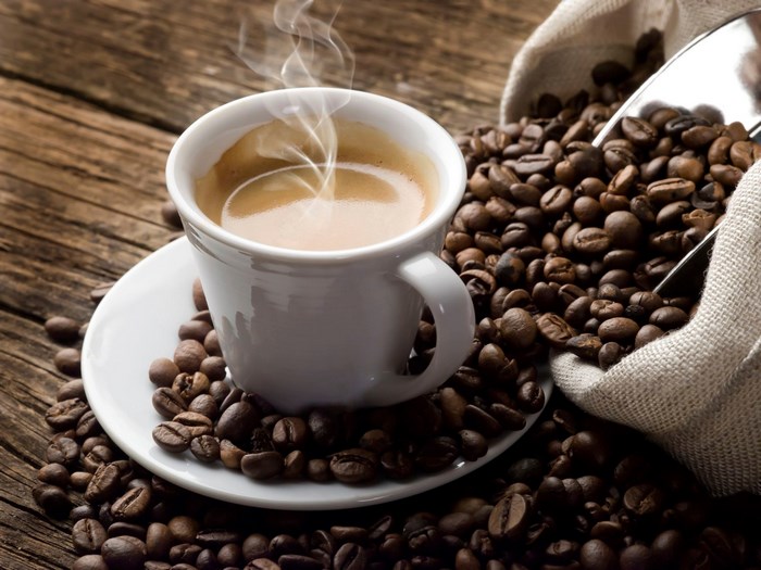 Espresso cup with coffee beans