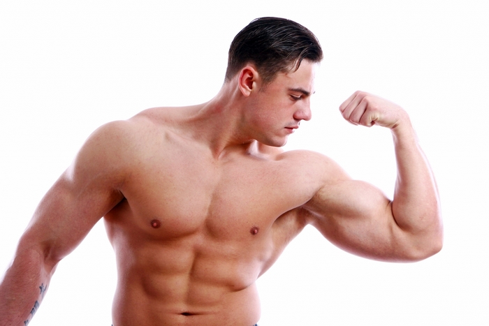 Muscular man flexing biceps