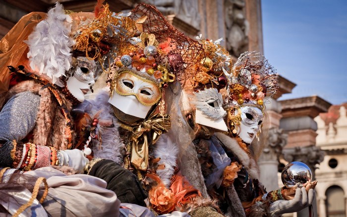 Carnival of Venice masked figures with ornate costumes