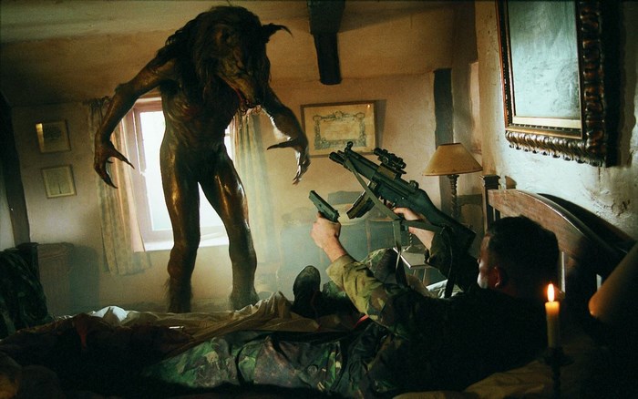 Werewolf attacking soldiers in a bedroom