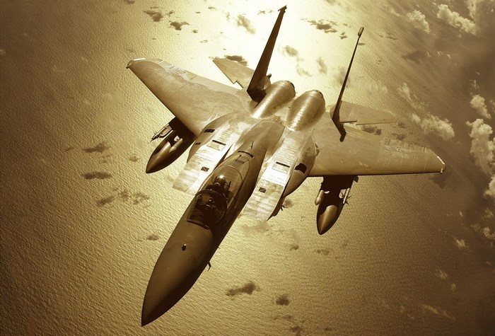 McDonnell Douglas F-15 Eagle flying over the ocean