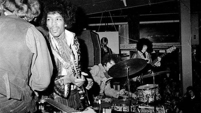 Jimi Hendrix performing with his band