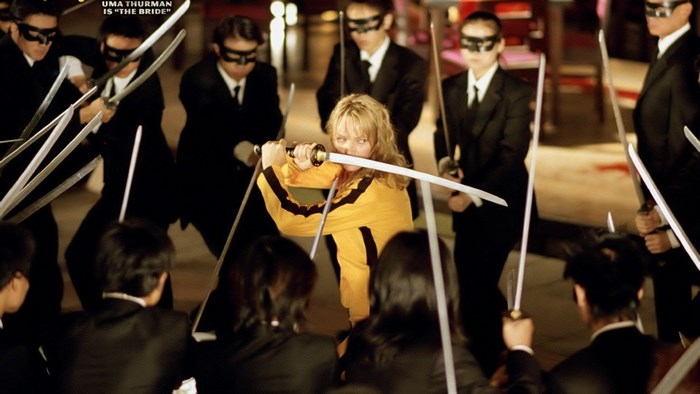 The Bride from Kill Bill Vol. 1 surrounded by swordsmen