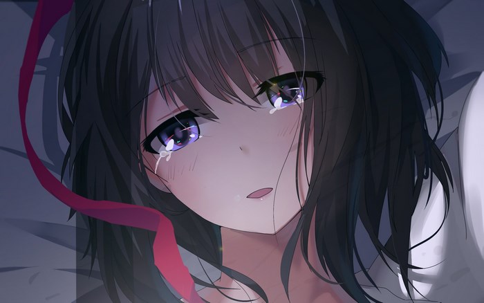 Crying girl with purple eyes and dark hair