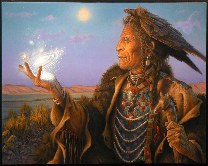 Native American man holding galaxy in hand