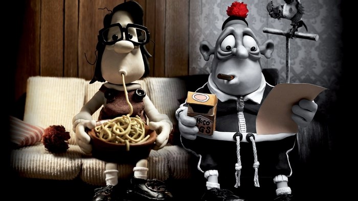 Mary and Max eating spaghetti