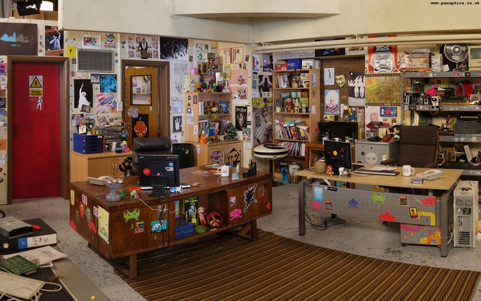 The IT Crowd office with computers and posters