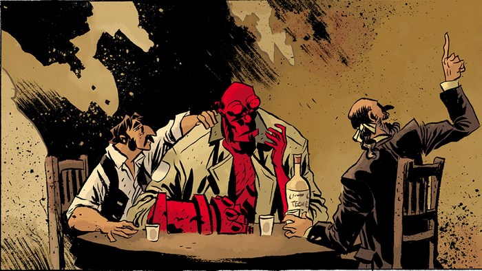 Hellboy and two men at a table with a bottle