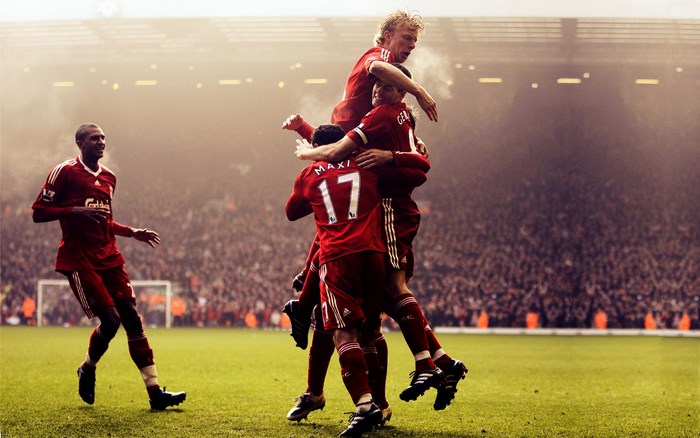 Liverpool FC players celebrating a goal on the field