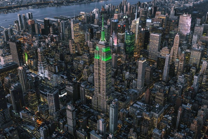 Empire State Building illuminated green in New York City
