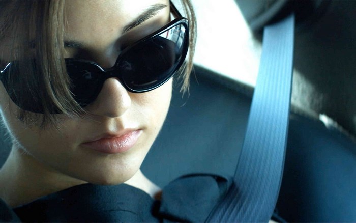 Sasha Grey wearing sunglasses in a car