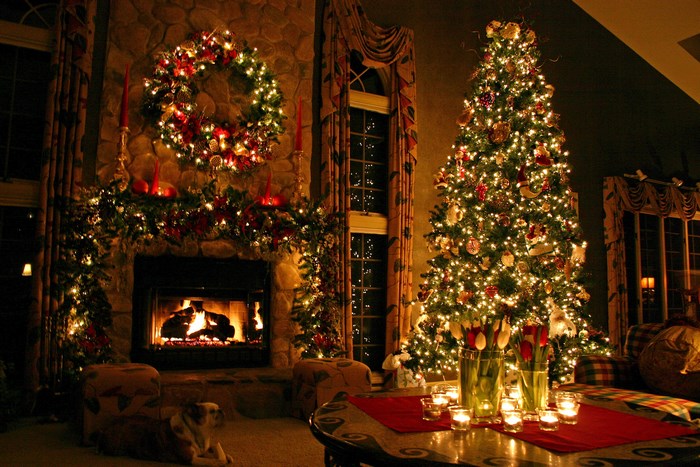 Christmas living room with fireplace and tree