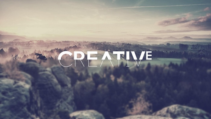 Creative typography over misty mountain landscape