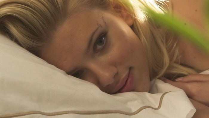 Scarlett Johansson lying on a pillow