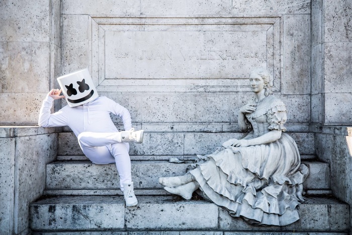 Marshmello and statue at Juan Valera monument