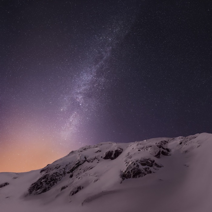 Milky Way over snow-covered mountains