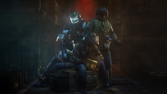 Four soldiers from Rainbow Six Siege in a dark room