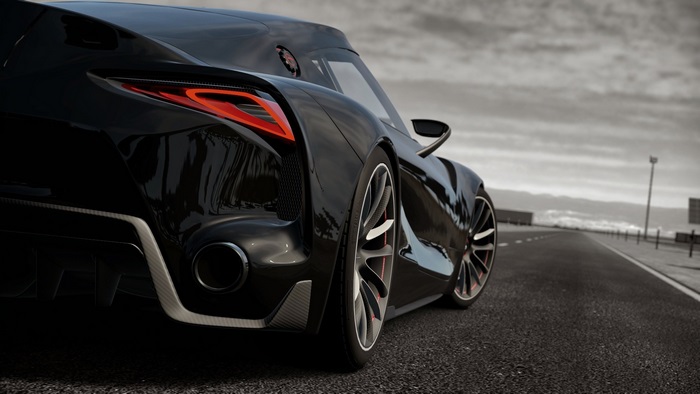Sleek Black Sports Car Rear 4K