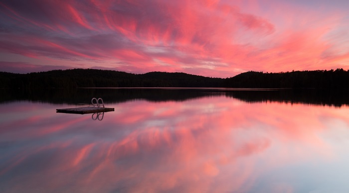 Lake at sunset with a dock