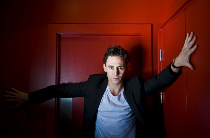 Tom Hiddleston in a black blazer and white t-shirt