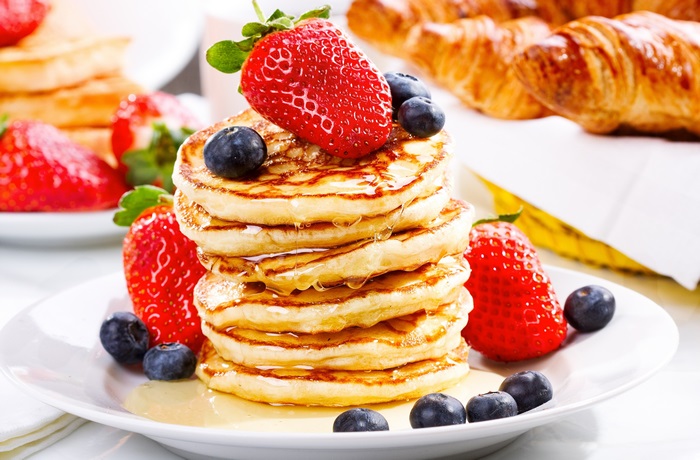 American pancakes with strawberries and blueberries 4K
