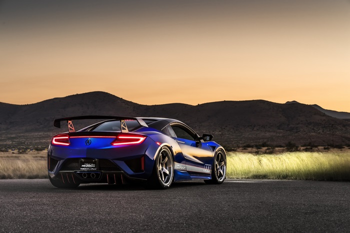 Blue Acura NSX with large rear spoiler
