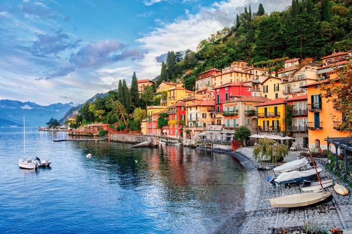 Charming Lakeside Village with Colorful Houses and Boats