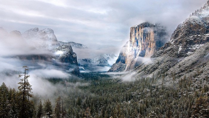 Snowy Yosemite Valley with El Capitan and Clouds