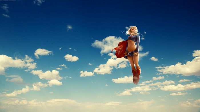 Supergirl flying in the sky