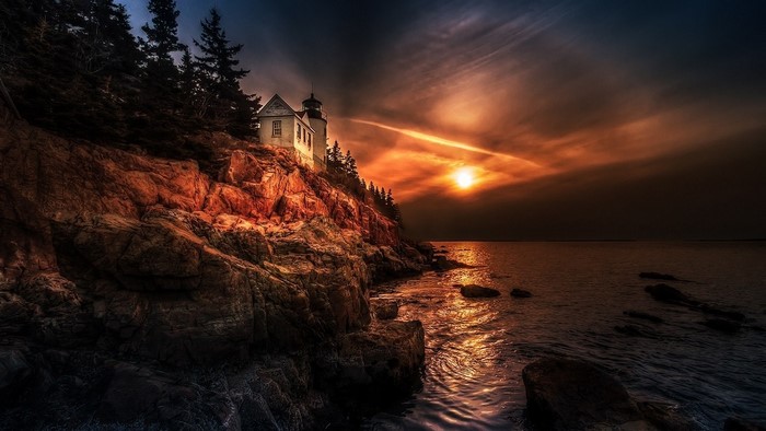 Maine Coast Sunset with Lighthouse and Rocky Shore