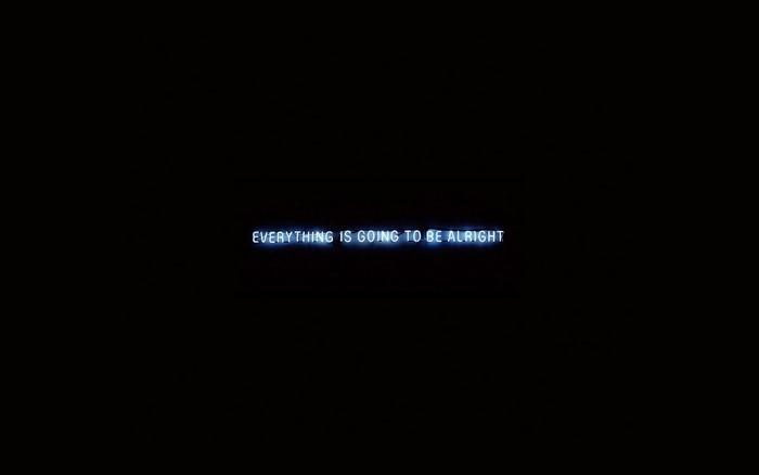 Neon quote on black background