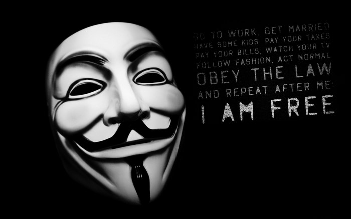 Anonymous mask with "I AM FREE" quote