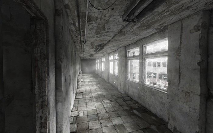 Abandoned hallway with broken windows