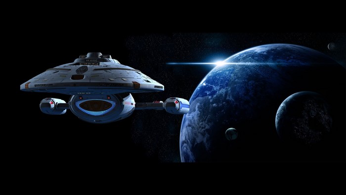 Star Trek Voyager spaceship near a planet
