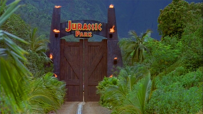 Jurassic Park Entrance Gate Amidst Lush Greenery