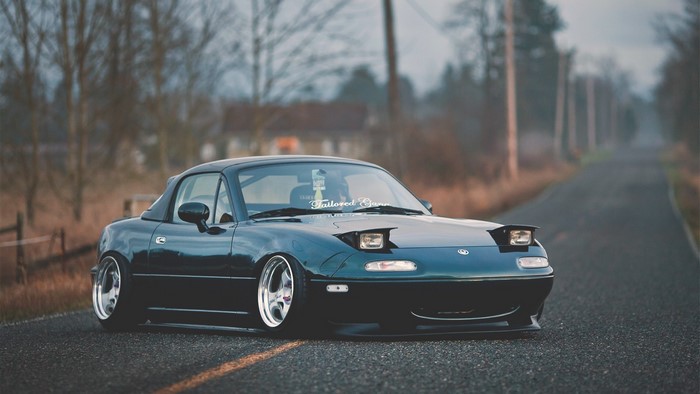 Mazda MX-5 Miata with "Tailored Gone" banner