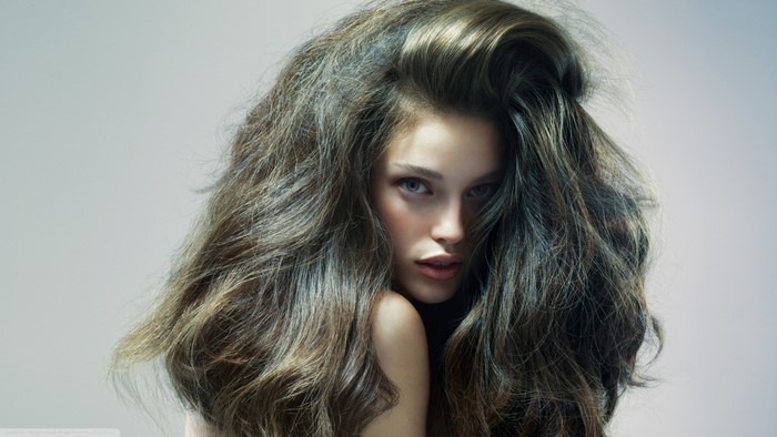 Woman with voluminous brown hair