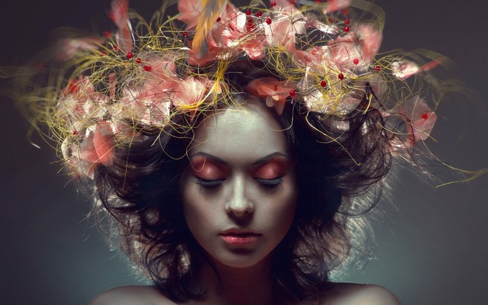 Woman with elaborate floral headdress