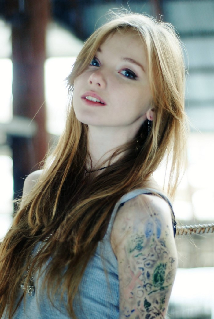 Olesya Kharitonova with Long Red Hair and Tattoo