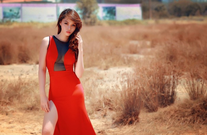 Woman in red dress outdoors