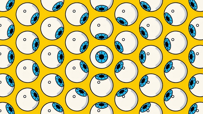Pattern of cartoon eyeballs on yellow background