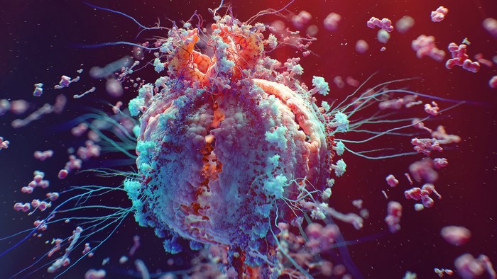 Microscopic view of a virus with spikes and surrounding particles