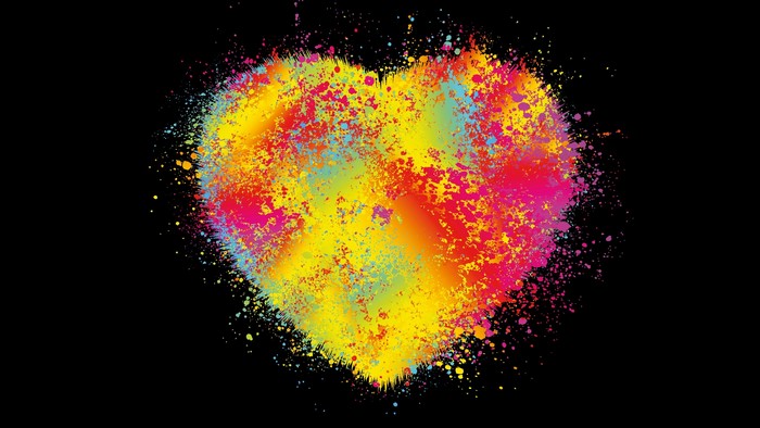 Colorful paint splatter heart on black background