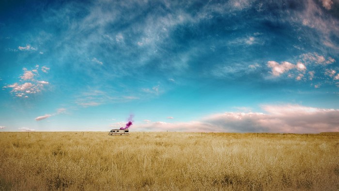 Breaking Bad RV in a field with purple smoke